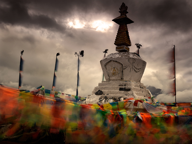 Prayer flags stream in the wind, carrying the dreams of a proud culture across their Tibetan homeland.
